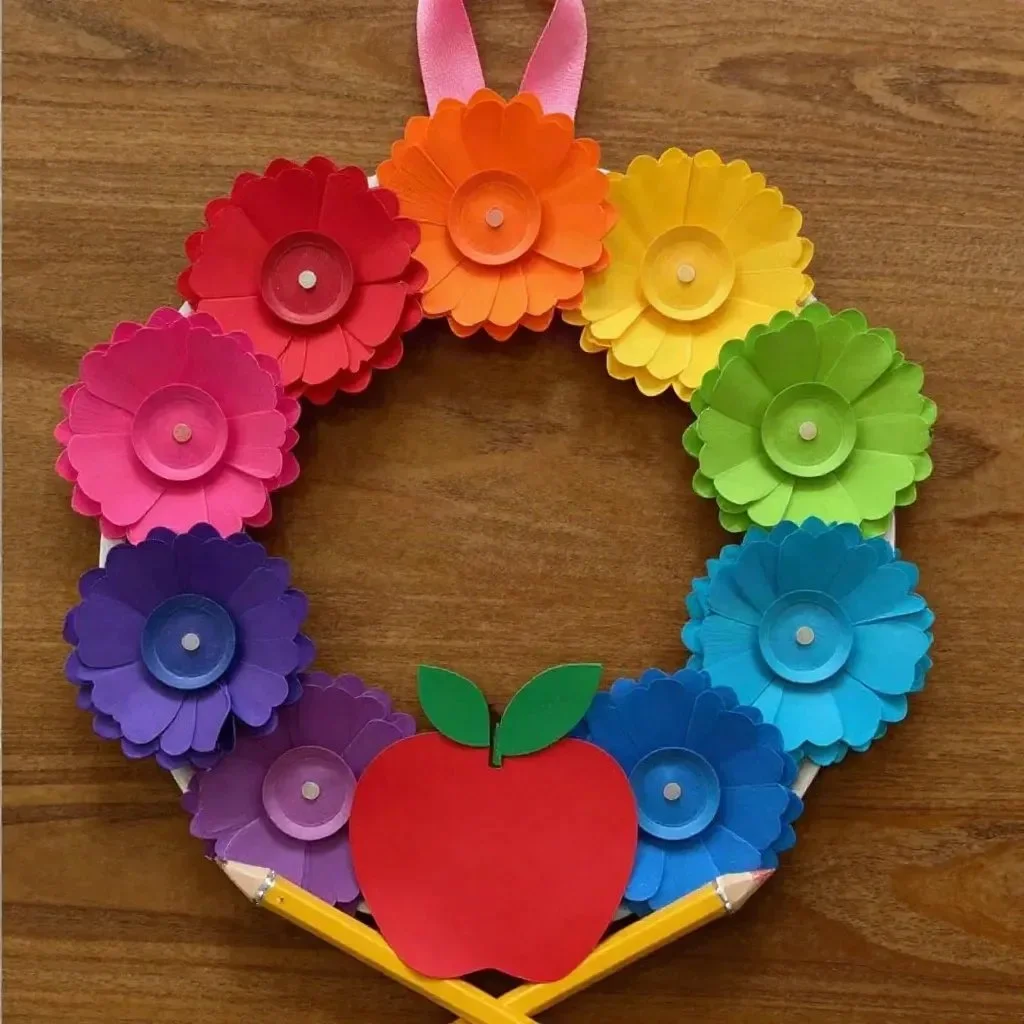 Rainbow cupcake liner flower wreath craft for kids