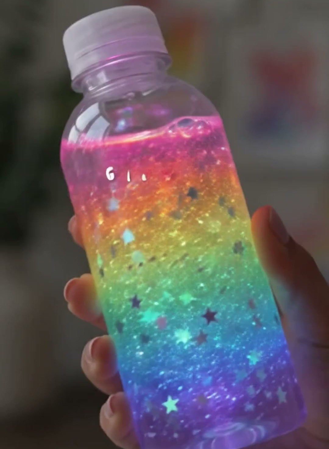 Glowing Rainbow Potion Bottle Turns Into Art